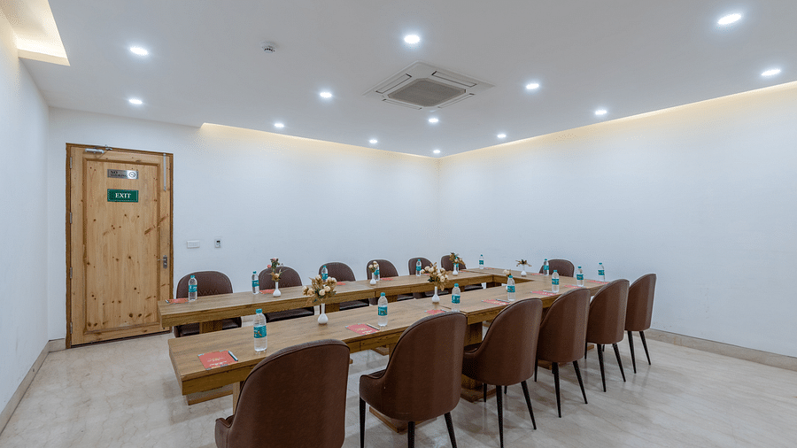 Spacious conference room with multiple chairs arranged for a meeting or event at DLS The Classio